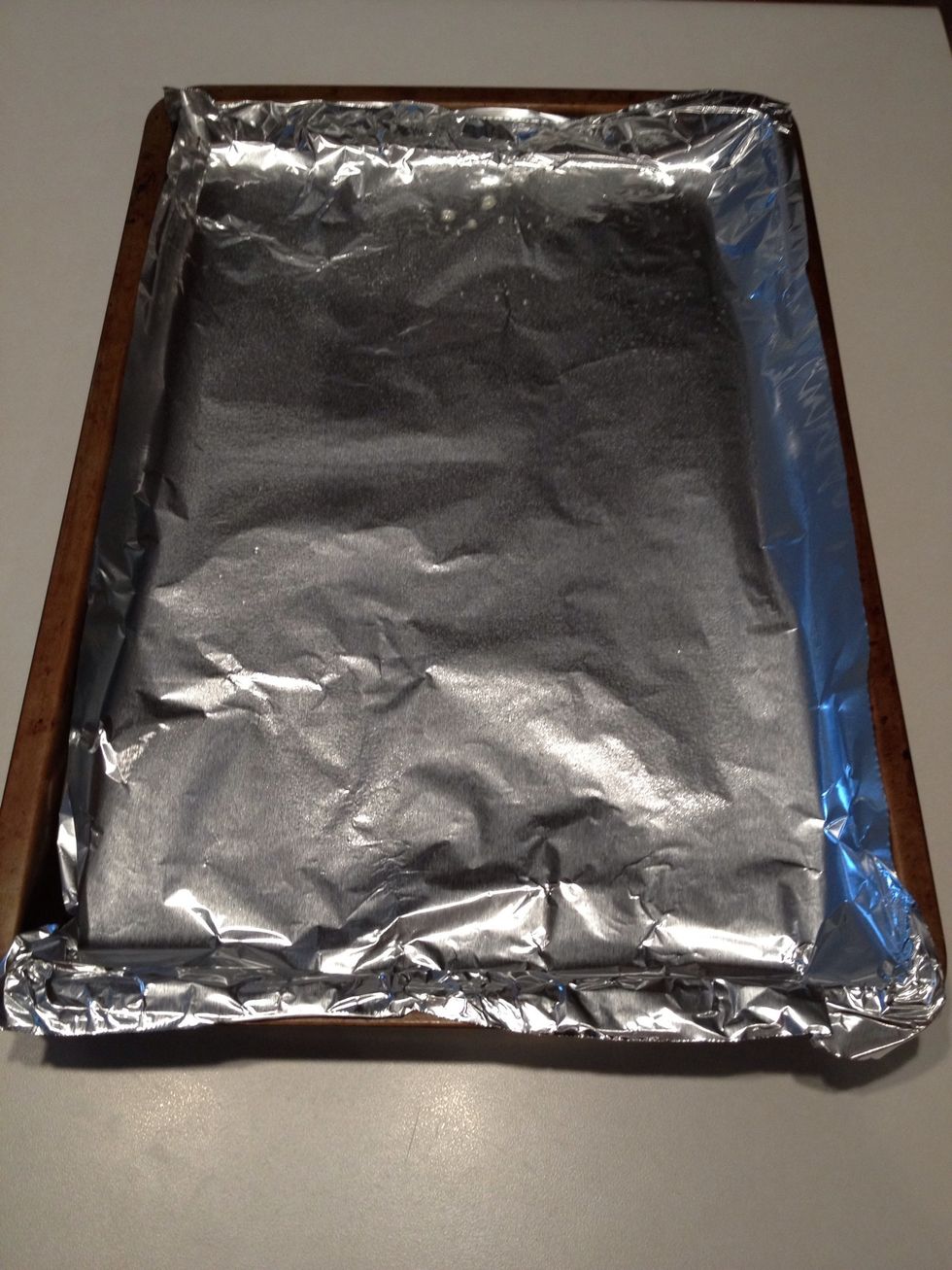 Cover a baking pan with aluminum foil. Spray with cooking spray.