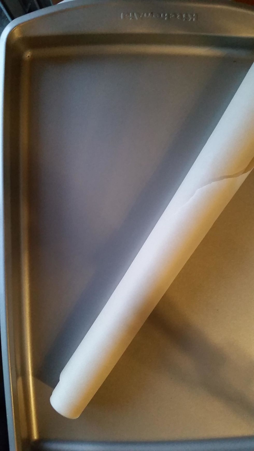 Cover a baking sheet with parchment paper