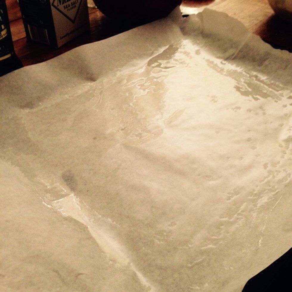 Cover a baking tray with greaseproof paper and then a thin layer of sunflower seeds oil