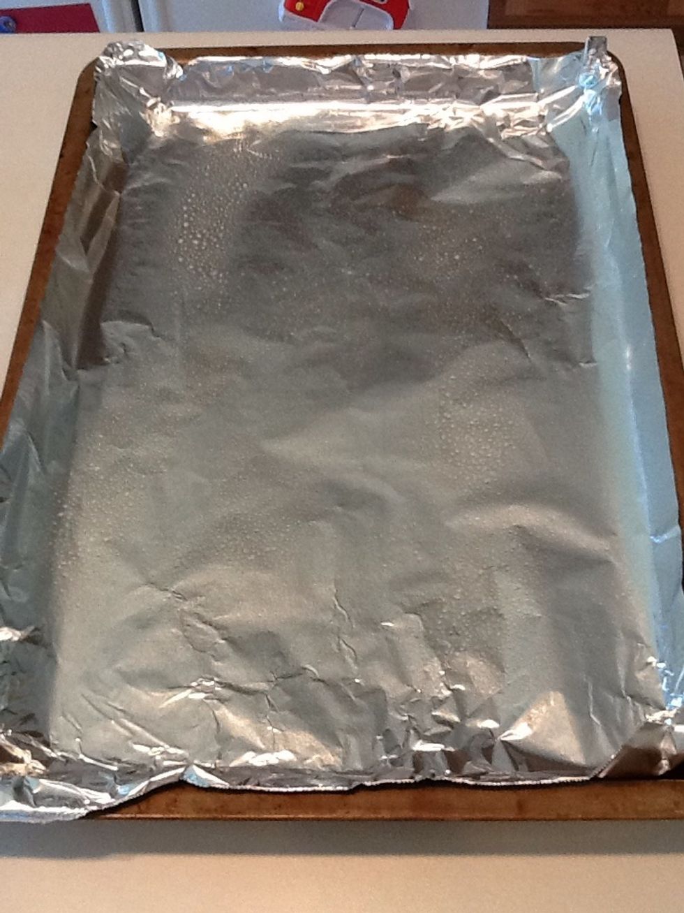Cover a cookie sheet with aluminum foil and spray with non-stick cooking spray. Turn on oven broiler.