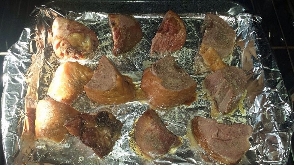 Cover a pan with foil, spray with Pam and place your cut, smoked turkey legs on it. Sprinkle with adobo and thyme. Place in oven at 350* for 45 min til browned.