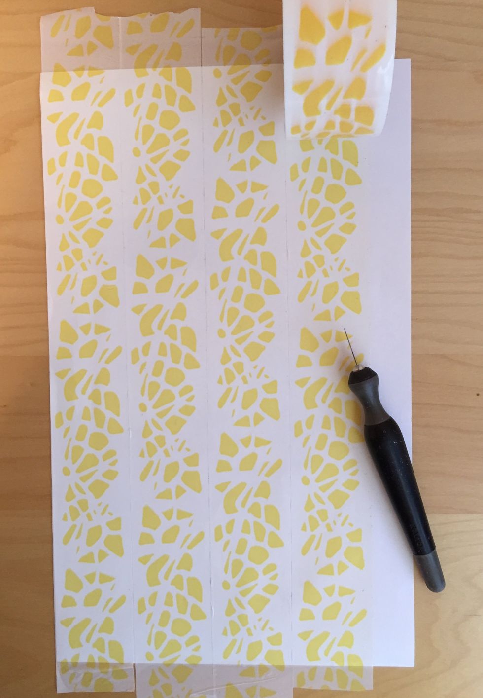 Cover a piece of computer paper with decorative tape. I am using tape that is 2" wide on an A4 size piece of paper.