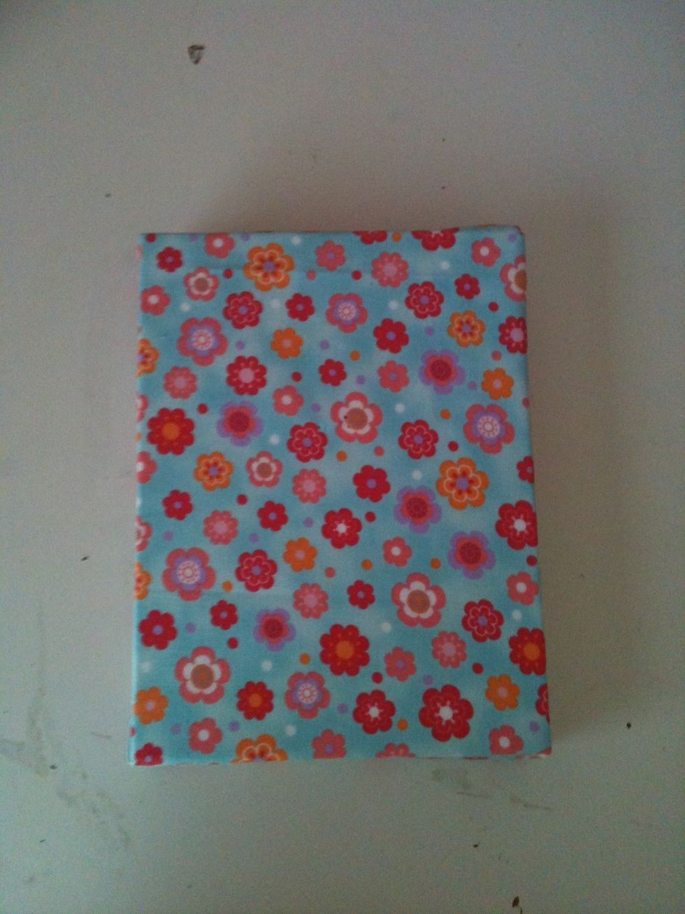 Cover a plain canvas with your favorite material