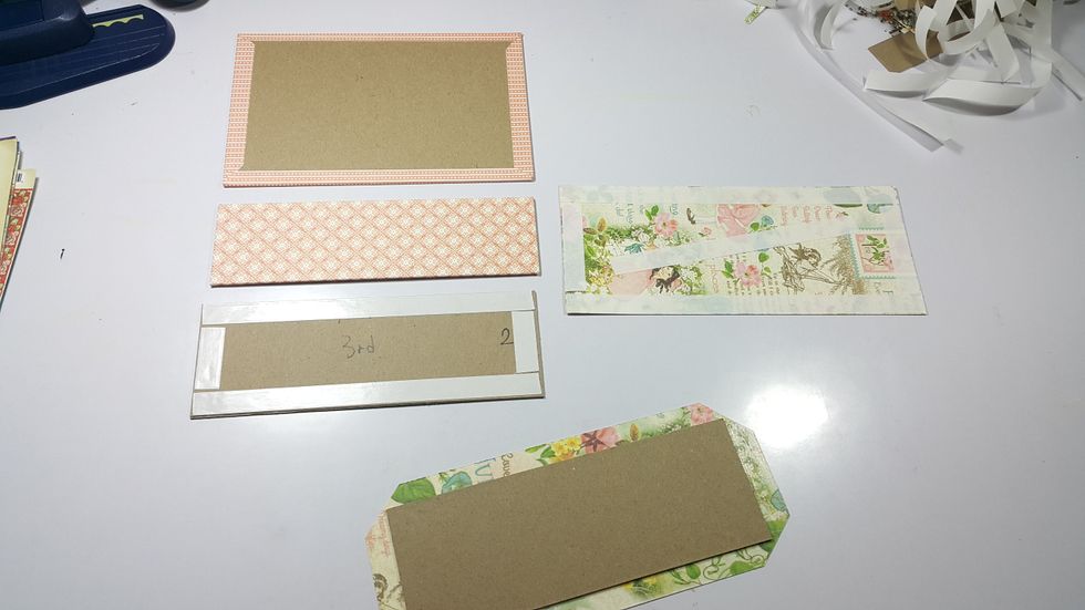Cover all with pattern papers, in order to use the same pattern paper of only 12", here the paper measurement: top and the first floor 8"x3-3/8", ground floor 8"5-1/4" and the basement 8"x3"