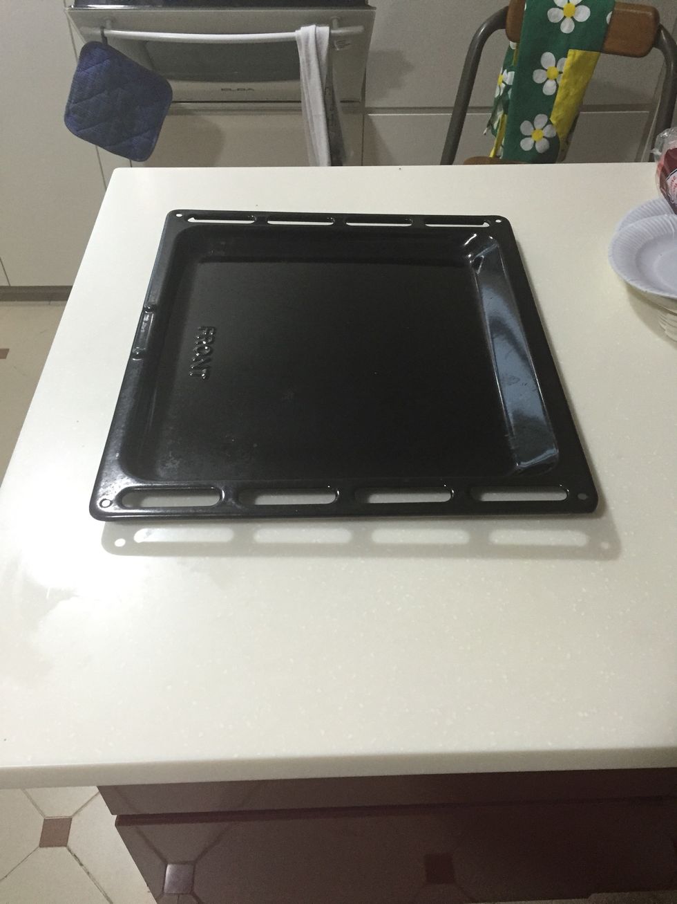 Cover an oven tray with a sheet of aluminum foil and spread the marinated potatoes around. Bake in the preheated over for 40 minutes.