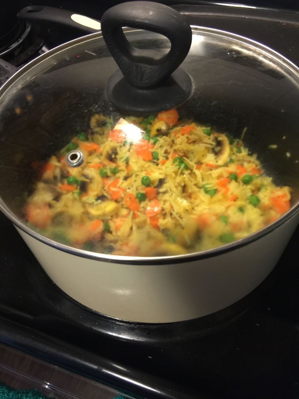 Cover and cook on low flame for 10 mins. To allow the vegetables to cook.