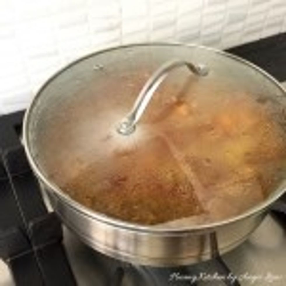 Cover and cook till the potatoes have softened and the curry forms a dry curry mixture.