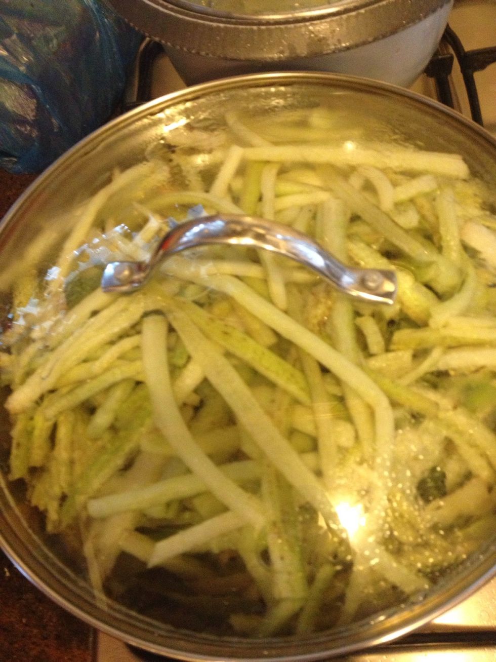 cover and let it simmer... avoid mixing until the stalks are wilted