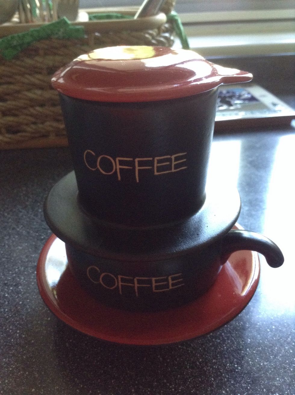 Cover and let it sit until it's done dripping into the cup below. This can take about a minute or so.