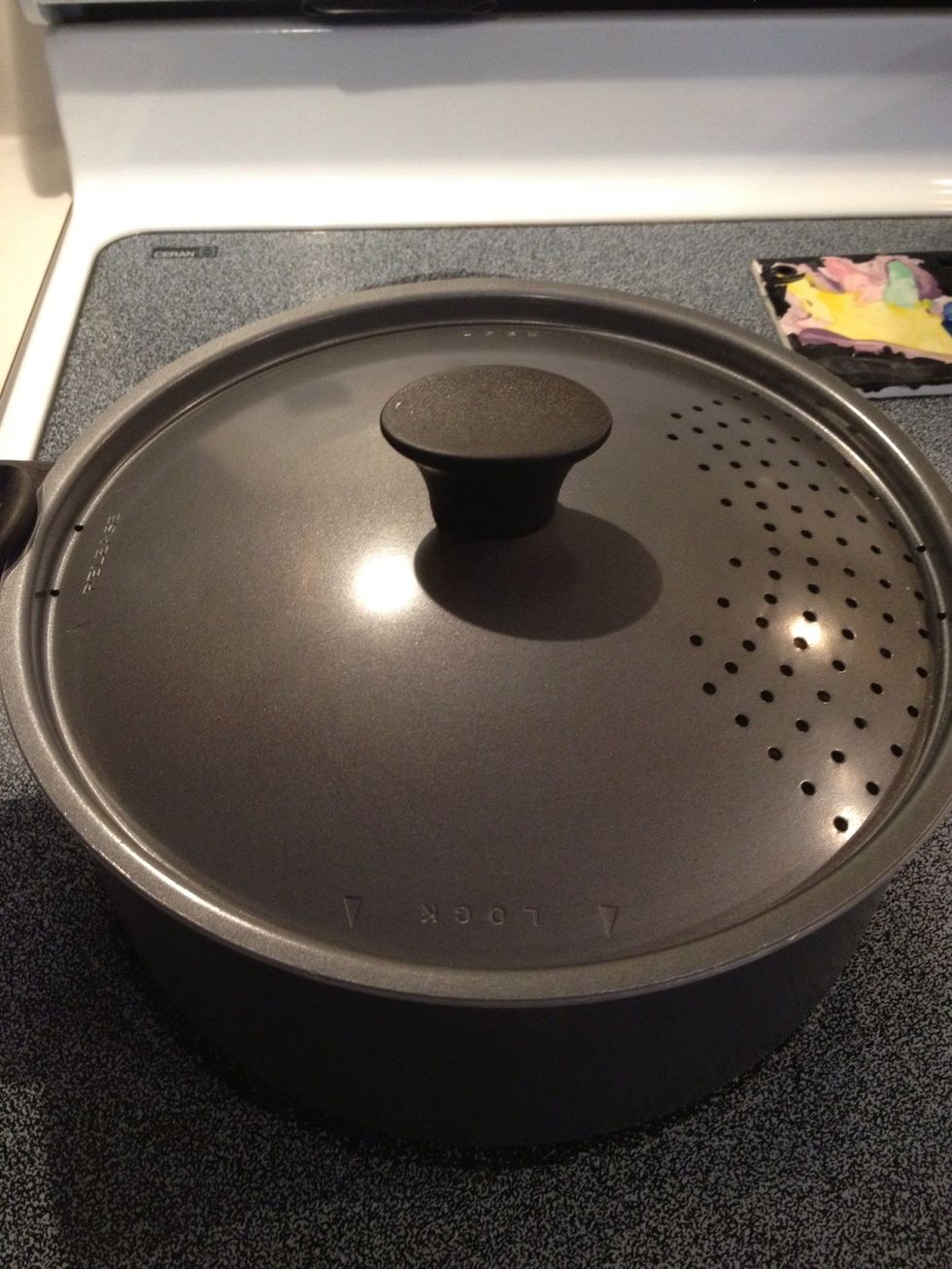 Cover and reduce heat to medium low.