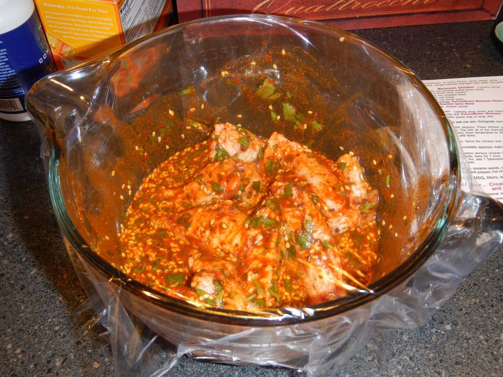 Cover and refrigerate over night for tastiest results. If you can't take it any longer pop them in the oven in a single layer in a baking dish at 375.