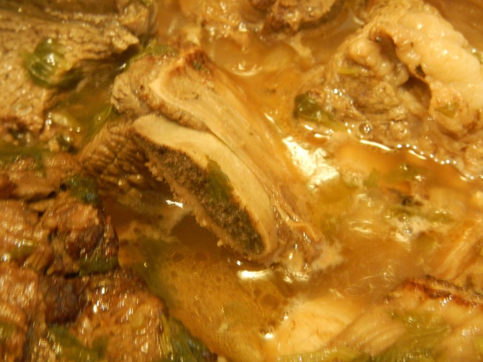 Cover and simmer on medium heat until the short ribs are falling off the bone and shredding