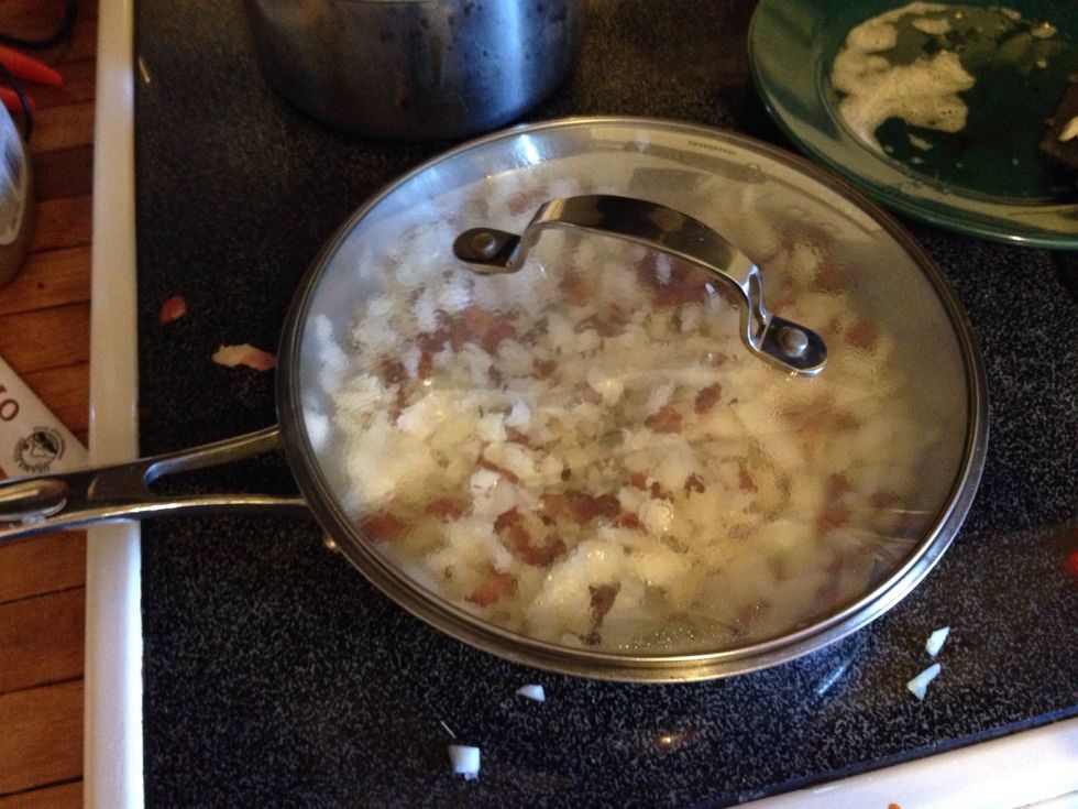Cover and turn heat to medium. Cook until onions are tender. About 5 min.