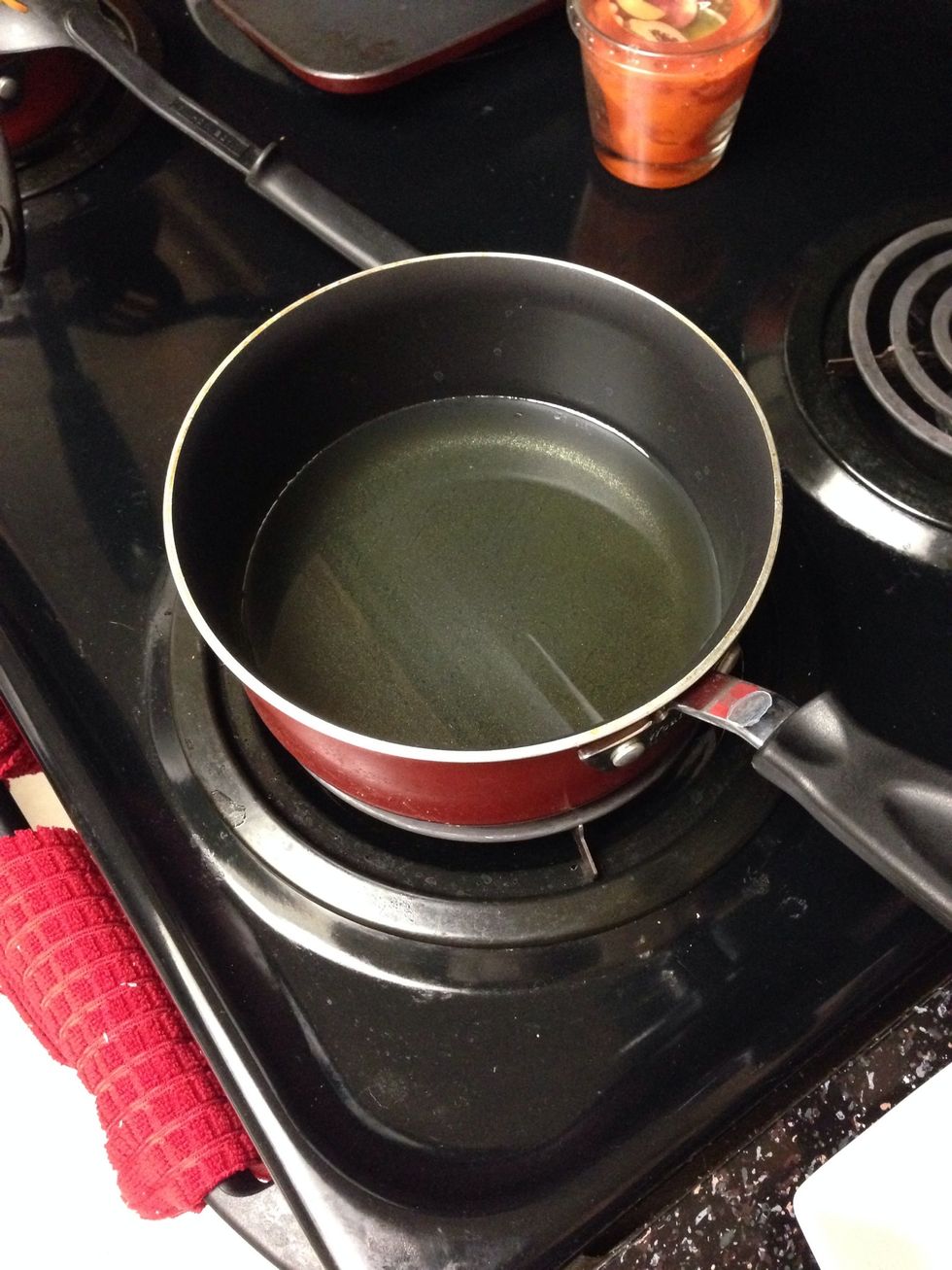 Cover at least 2 inches of cooking oil in the medium sauce pan and preheat. (Deep fryer would be nice to have). Then place fries in carefully and fry for about 4-6 mins.