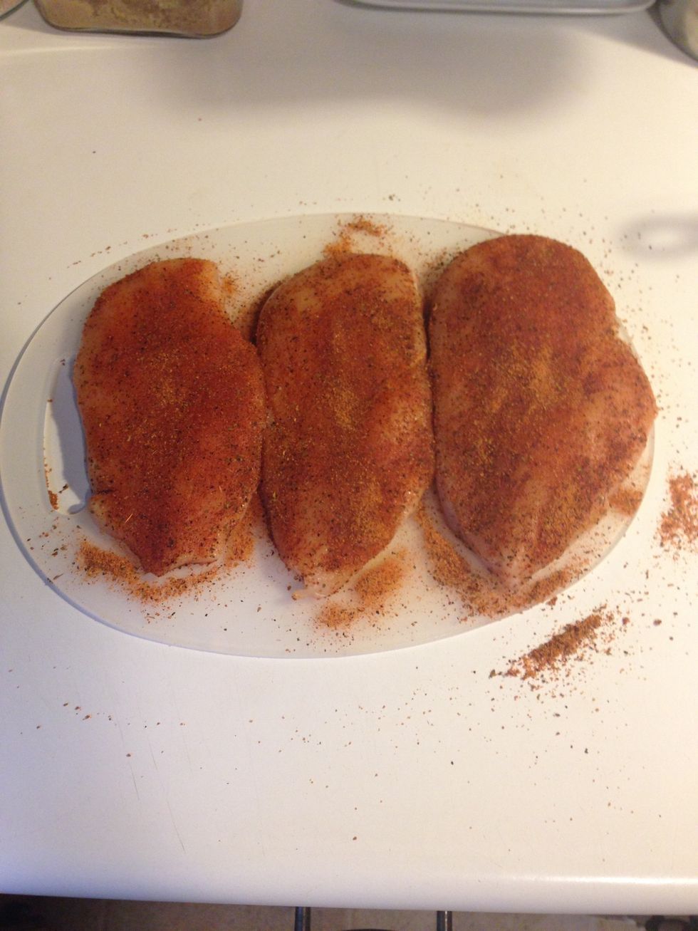 Cover both sides of each breast with enough rub to leave no bare spots. Press the rub gently into the meat with your hands.