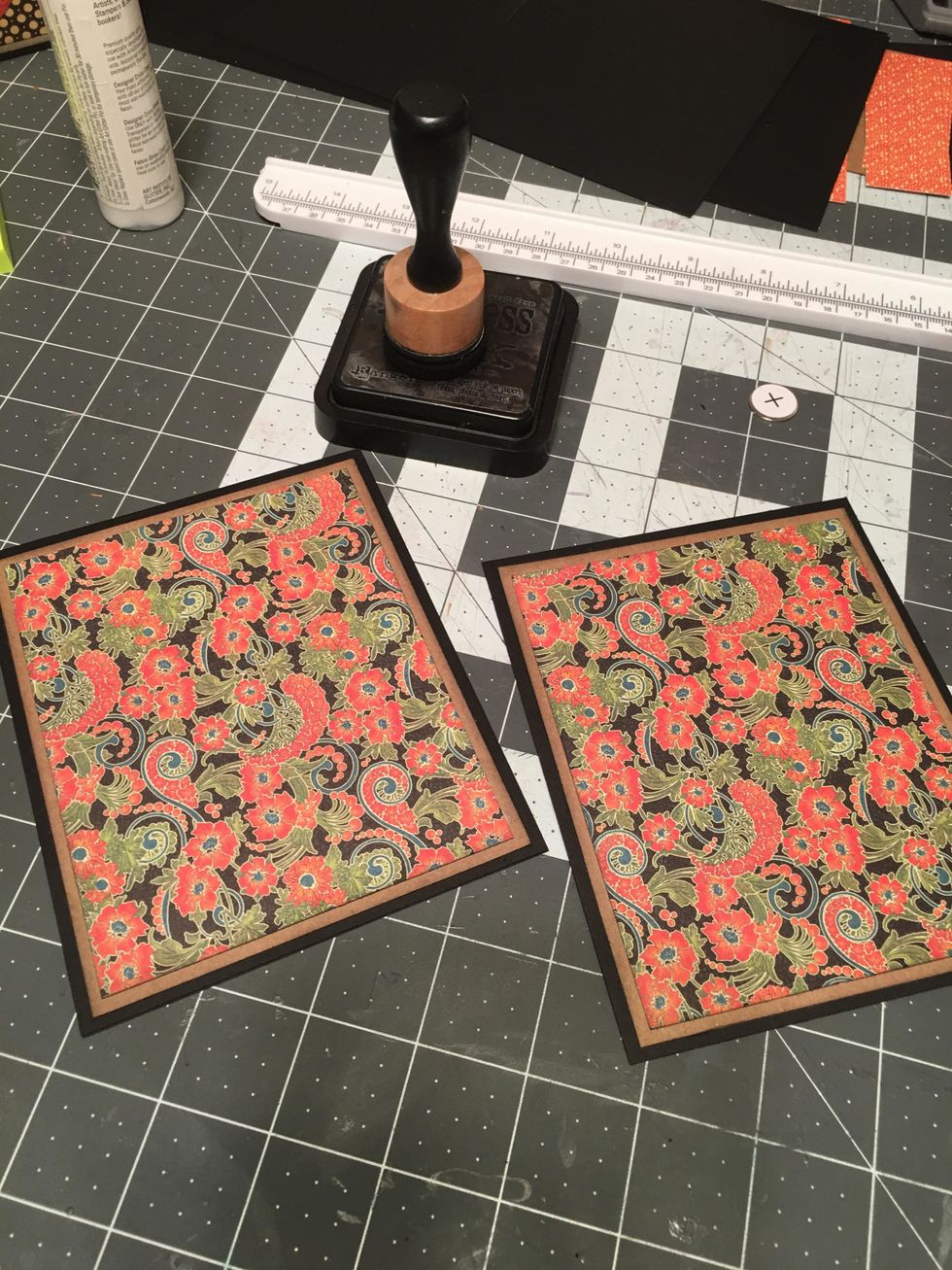 Cover both the front and back covers with the patterned paper.
