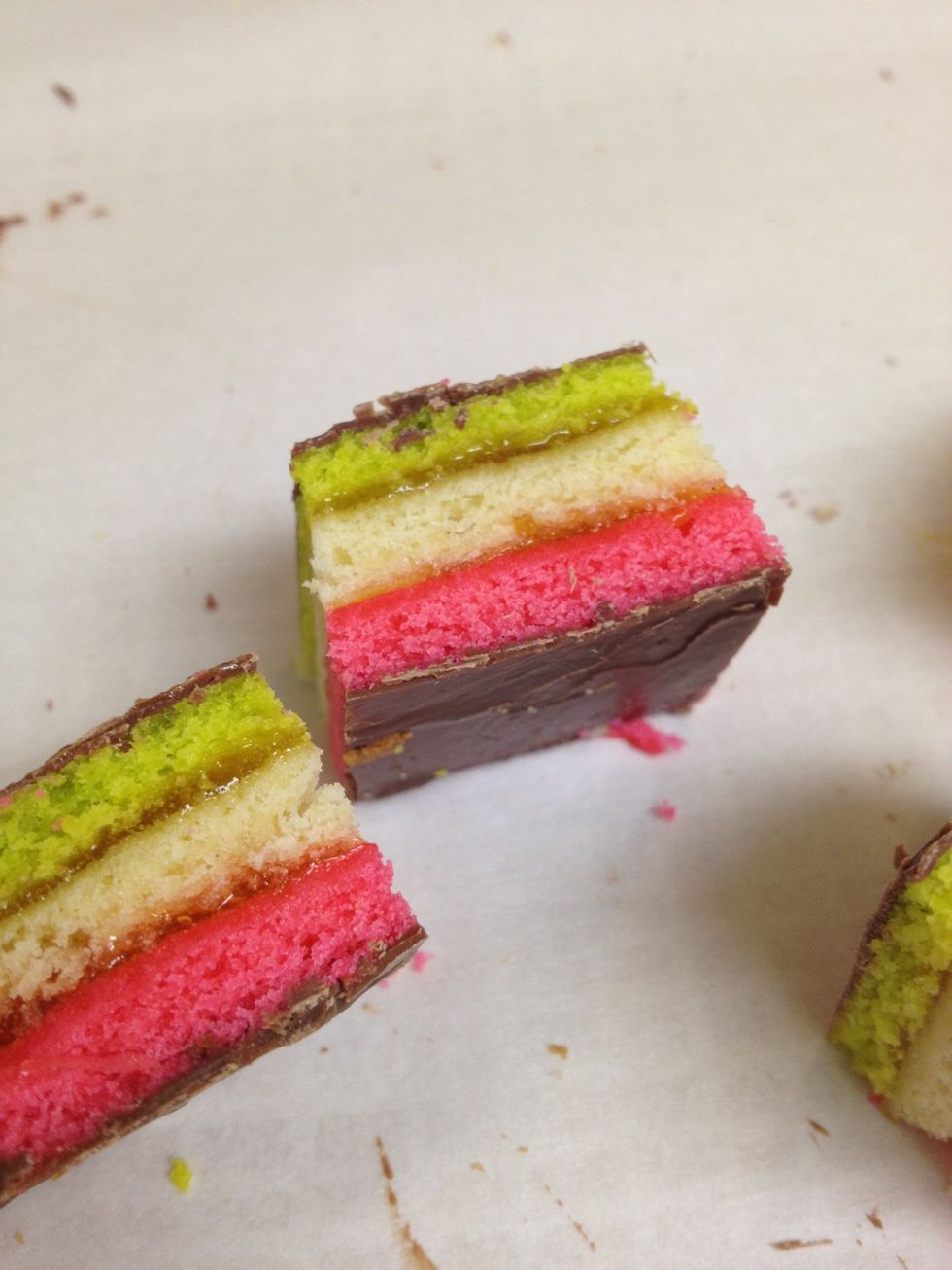 Cover cake and freeze for 30 minutes! This makes cutting much easier! I cut mine into 1 inch squares- but you can cut them into whatever size you prefer!