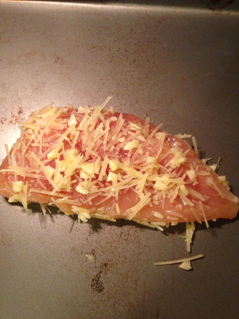 Cover chicken breast with mixture (both sides) and place on a baking sheet.