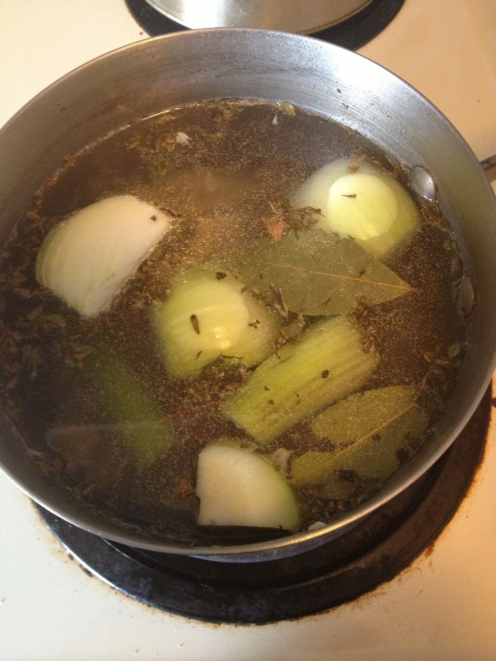 Cover chicken& vegetables with 5 cups of water& season with salt& pepper. Set heat to high and bring to a boil.