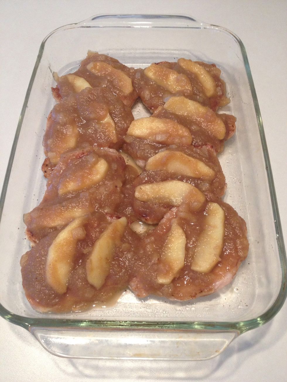 Cover each pork chop with apple mixture and arrange apple slices neatly on top.
