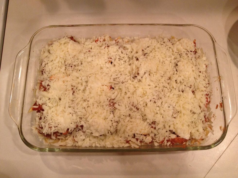 Cover everything with shredded mozzarella cheese.