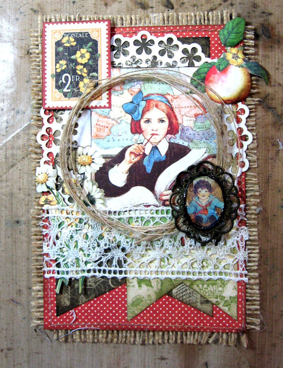 Cover image with a layer of Glossy Accents. Let this dry, then use more Glossy Accents to attach frame to the card, as seen here.