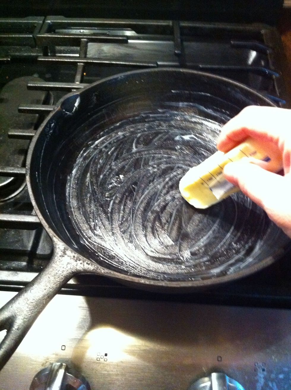Cover iron skillet or pan with solid fat. May use butter, bacon drippings, Crisco, or solid coconut oil...as long as it is solid at room temperature.