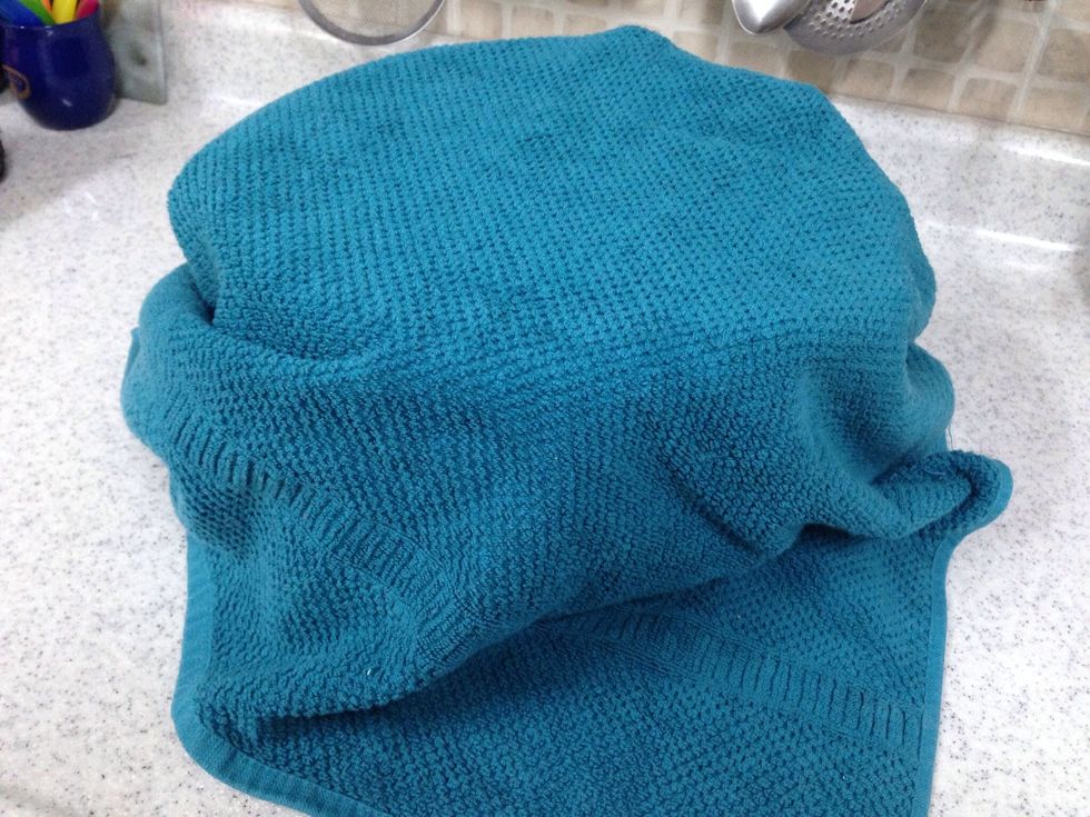 Cover it and put it in a warm place again