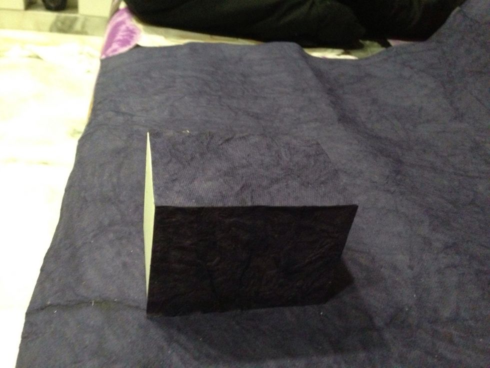 Cover it wid any fancy paper .. I hav used a handmade paper