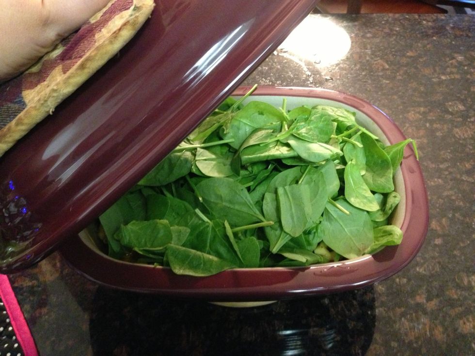 Cover & let sit. The heat from the soup will wilt the spinach. To speed process you can put in micro for another few minutes.
