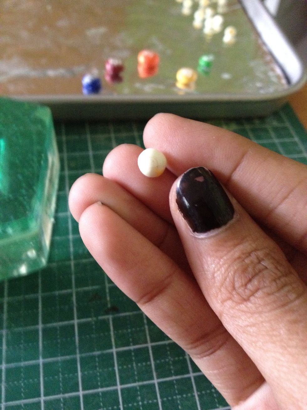 Cover one of the side (the less prettier one) by pushing the edges upwards, concealing the yolk.