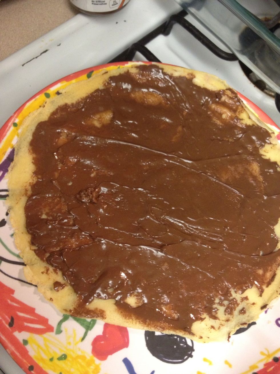 Cover one whole side in nutella