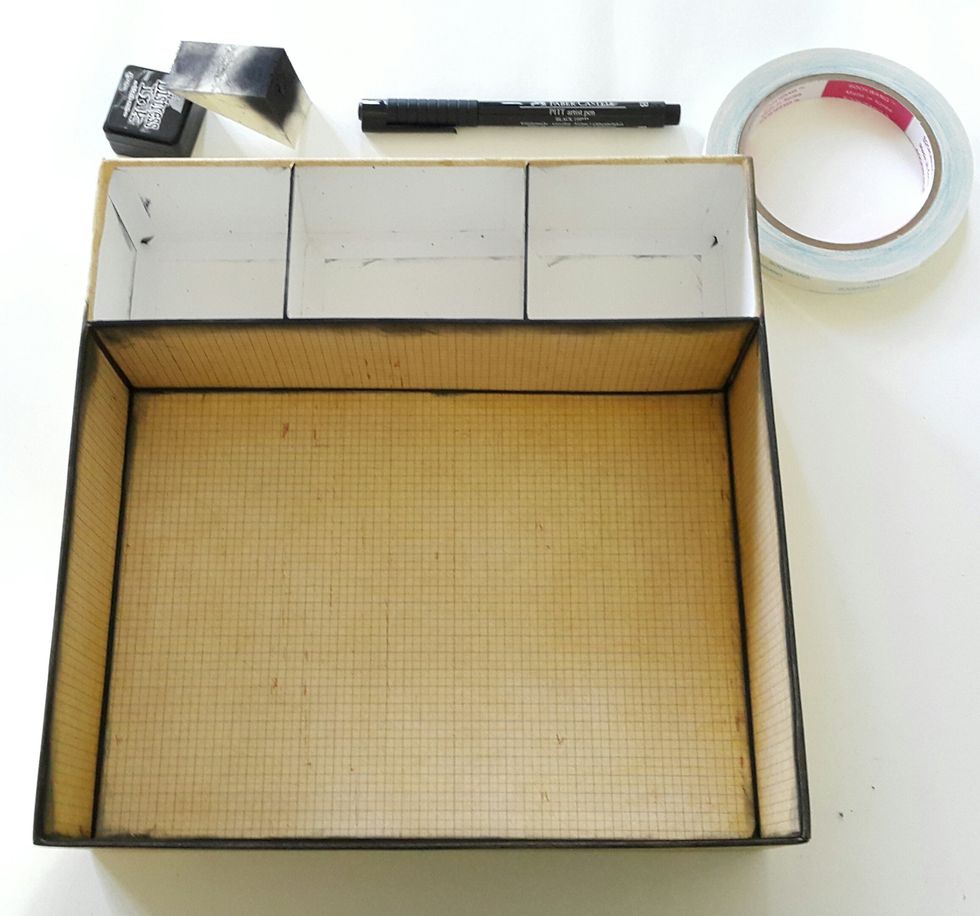 Cover outside with paper, 11\u00bd\u201dx4\u00bd\u201d(2), 9\u00bd\u201dx4\u00bd\u201d(2). Cut selected paper, 9\u00bd\u201dx7\u201d(1) for the inside base, 7\u201dx2\u00bd\u201d(2) and 9\u00bd\u201dx2\u00bd\u201d(2) for the sides. Adhere, color with Distress Ink and black marker.