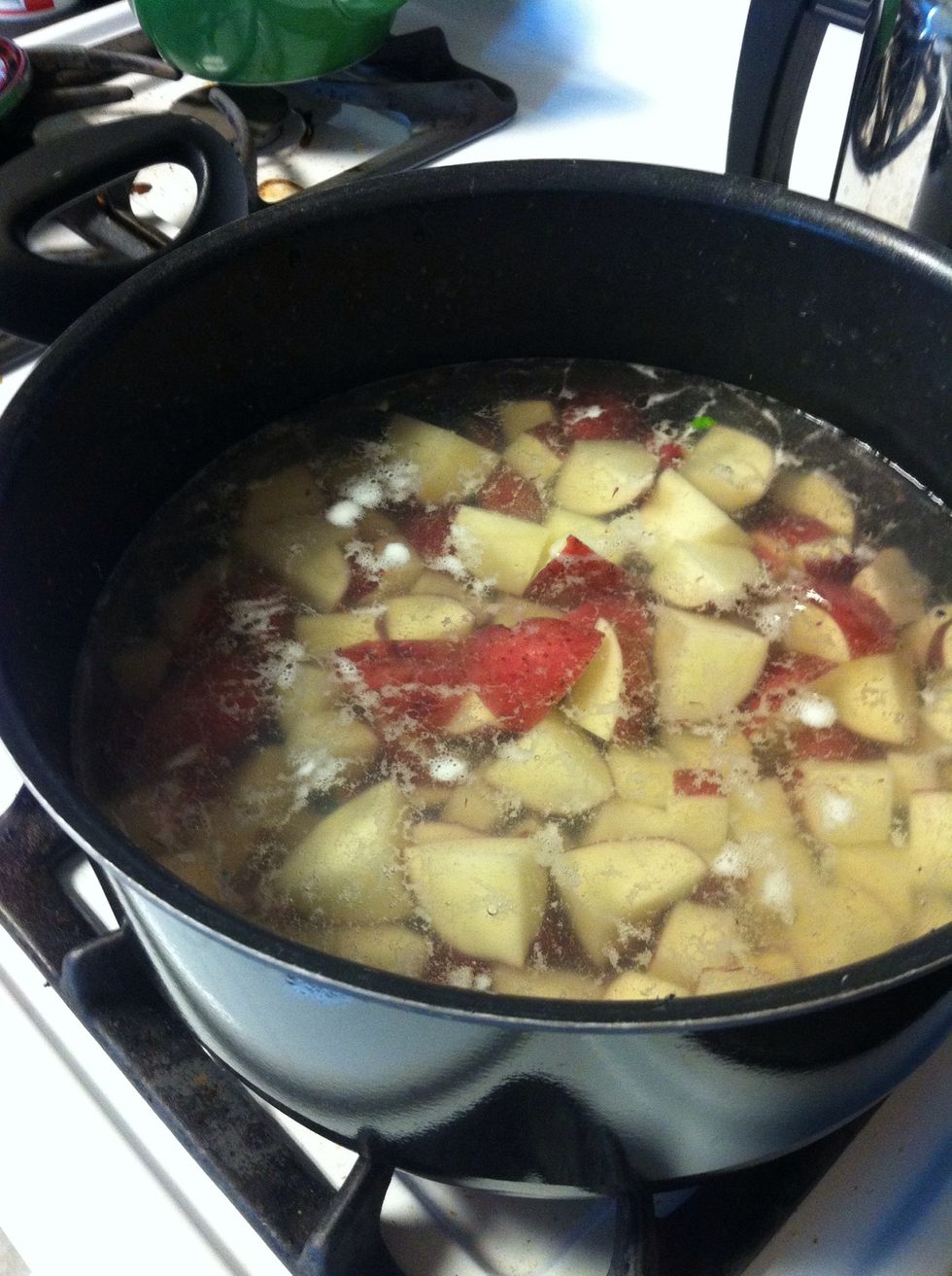 Cover potatoes with water in a medium saucepan; season with salt, and bring to a boil.