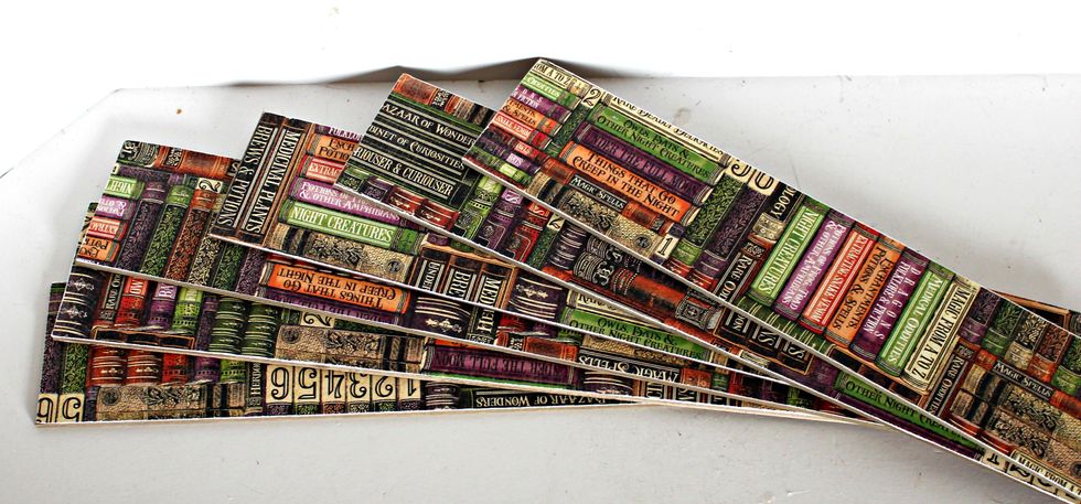 Cover six 2 1/2" by 12" chipboard pieces with Graphic 45 Rare Oddities collection.