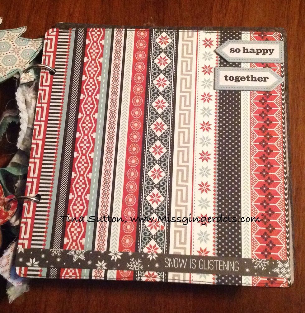 Cover square with stripe paper. Embellish as shown. The strip at the bottom is a zip strip from a piece of patterned paper.