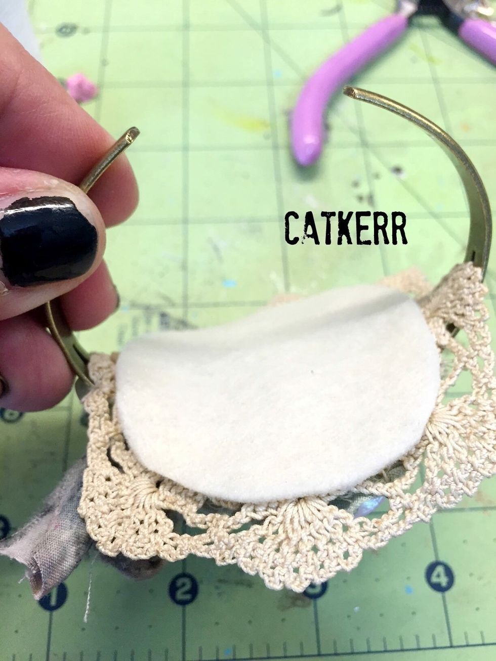 Cover the back by gluing on a piece of felt. xoxo