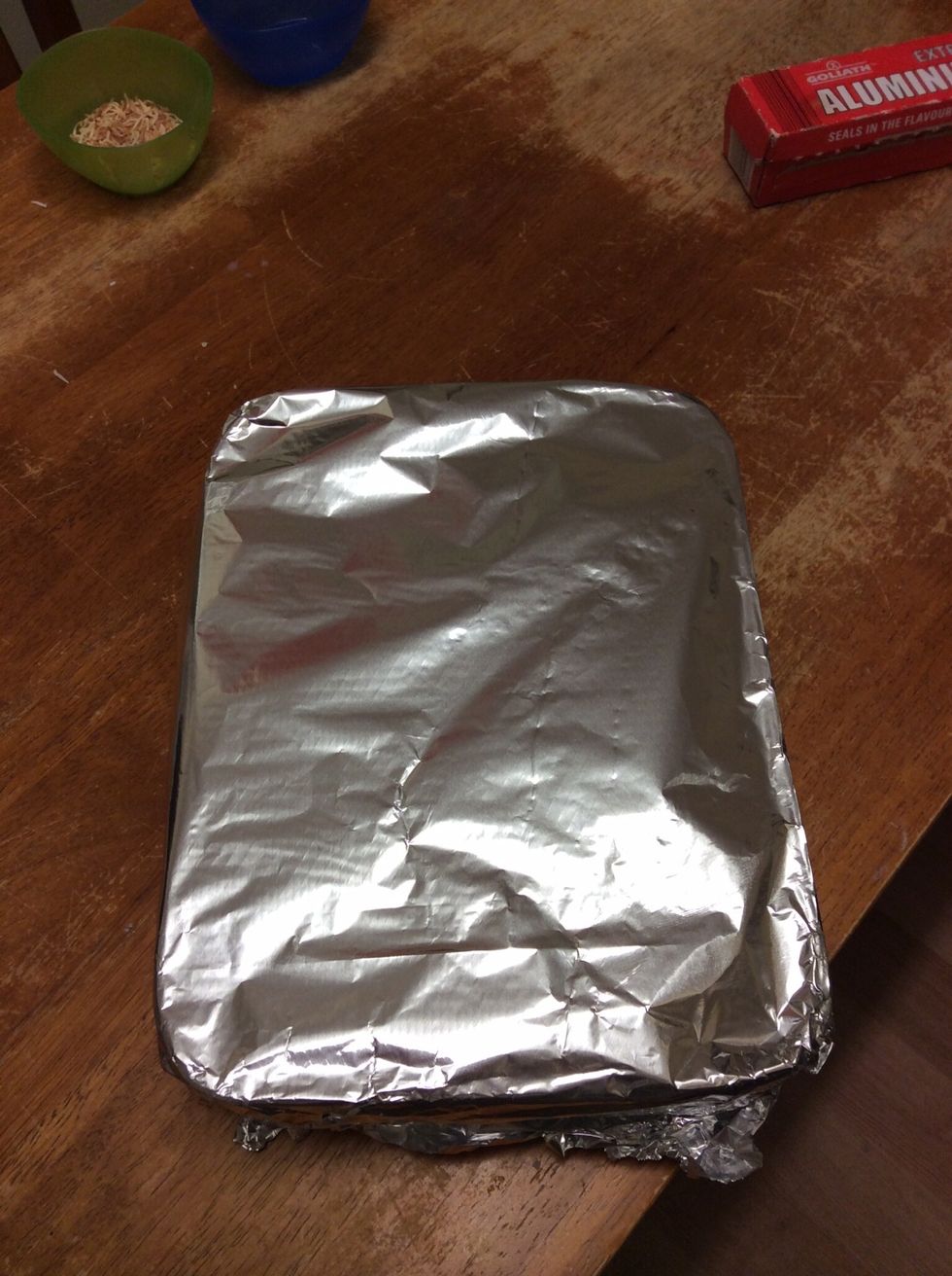 Cover the baking dish with tin foil