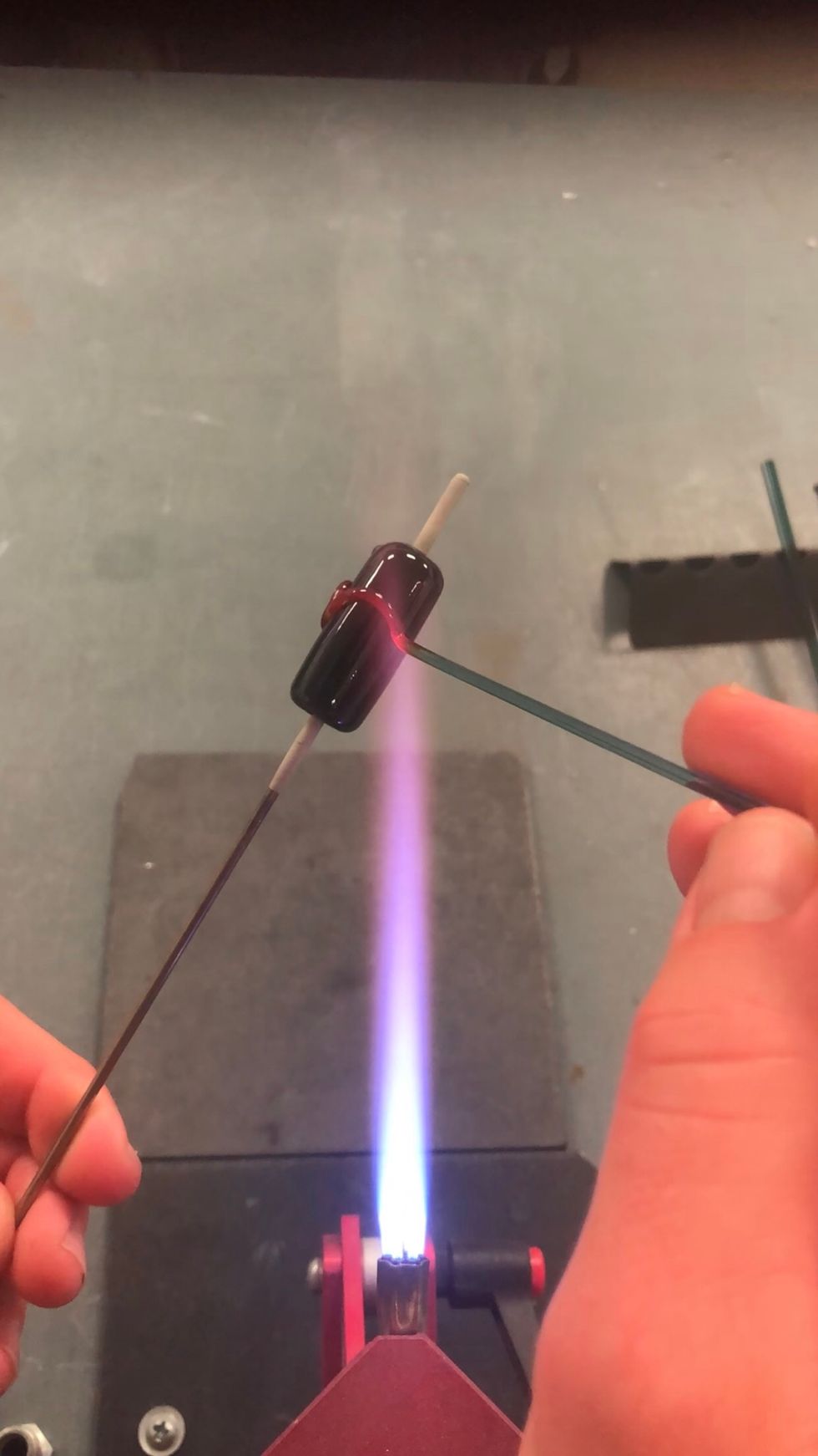 Cover the base bead in large, branching curlicues.