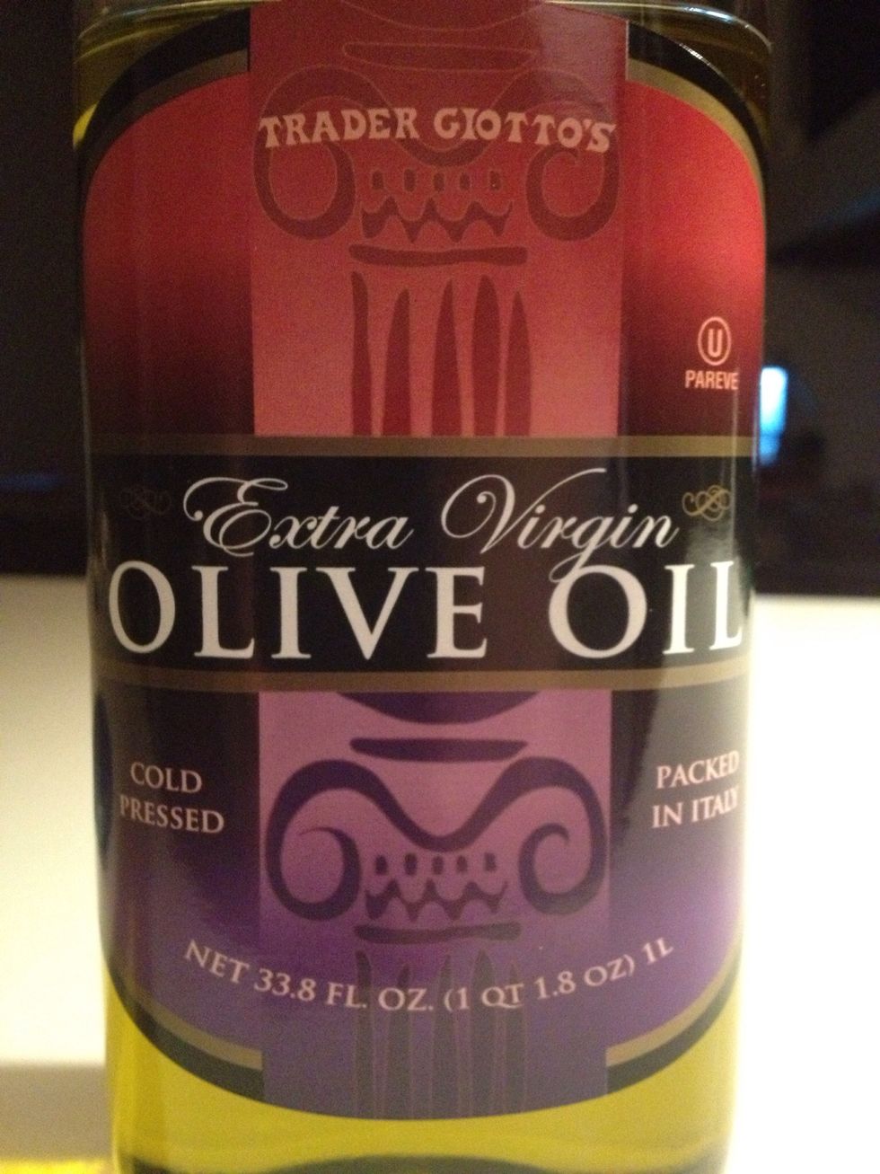 Cover the bottom of the skillet with about a 1/4 inch of olive oil and heat until the oil is hot. Don't use too much oil, just enough to cook the eggs. Too much will make the final product oily.