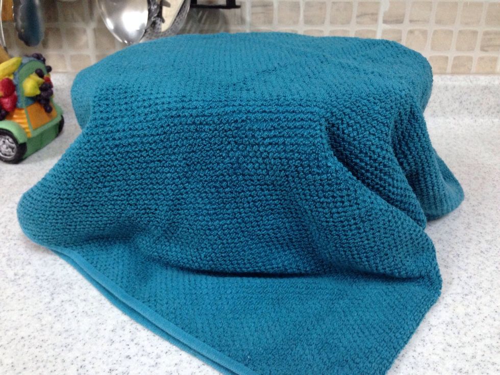 Cover the bowl by a plastic foil and put the bowl in a warm place ( the dough needs a long time to become double at least 2 hours )