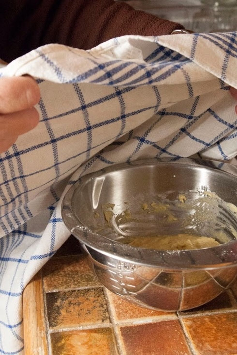Cover the bowl with a towel.