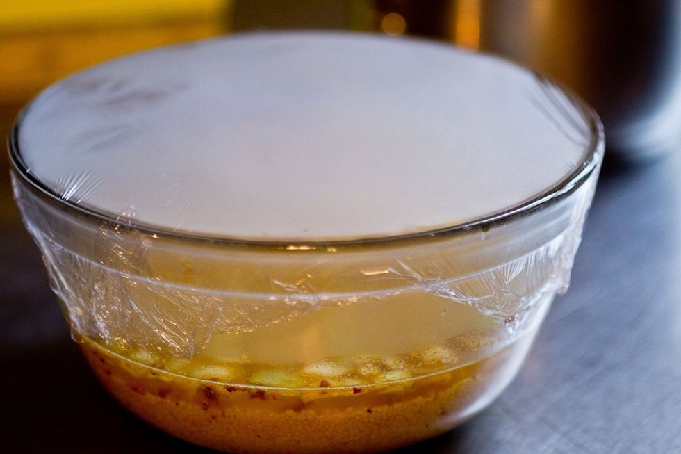 Cover the bowl with plastic wrap.