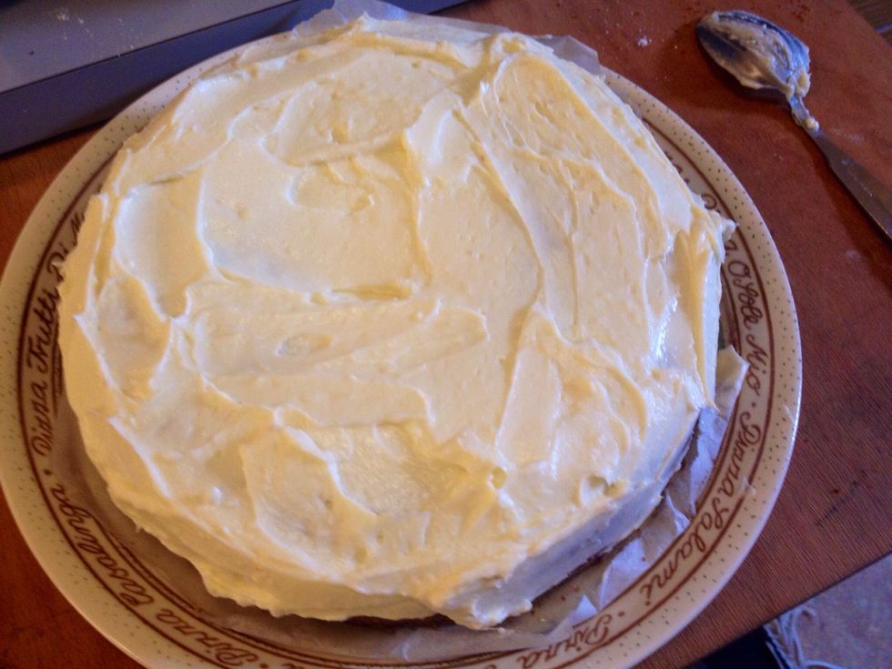 Cover the cake with frosting.