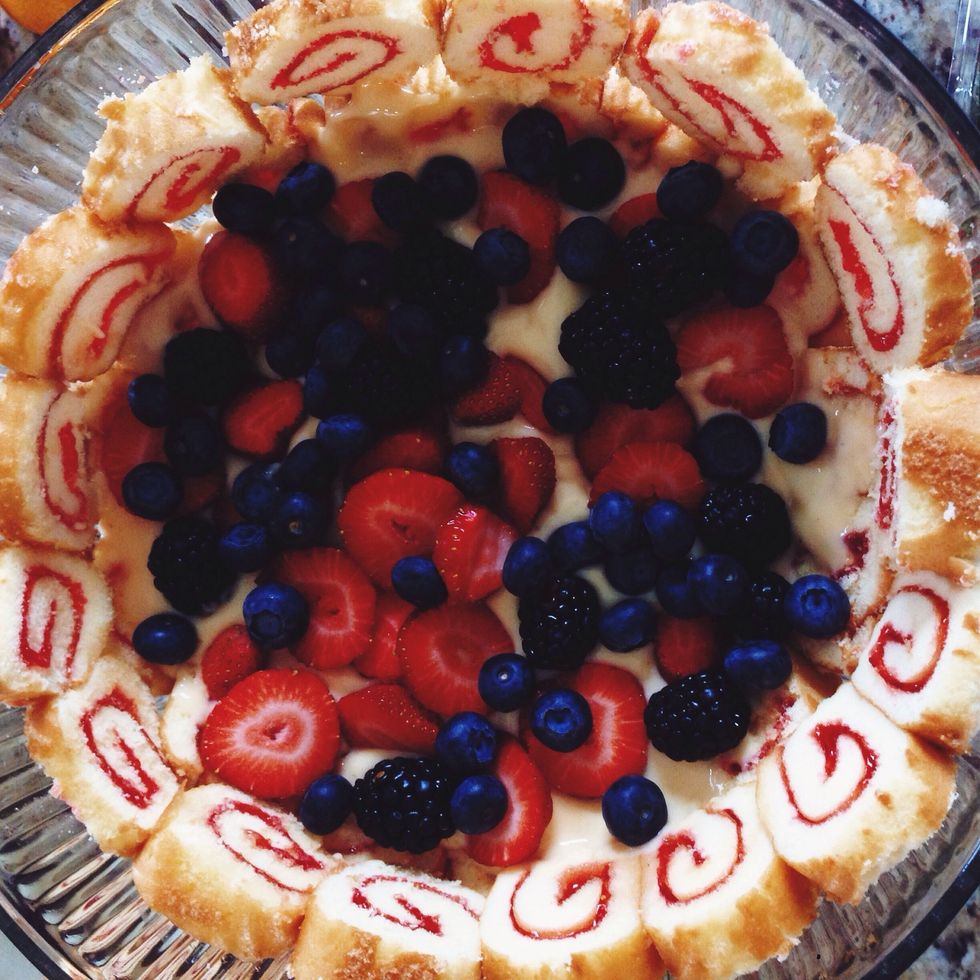 Cover the custard with a layer of berries.