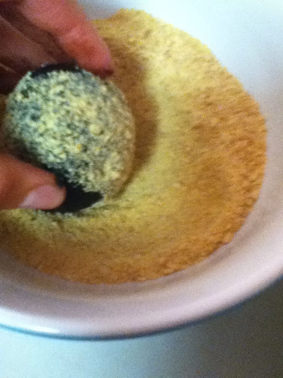 Cover the dough completely with the graham cracker crumbs.