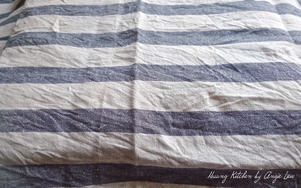 Cover the dough with a damp cloth.
