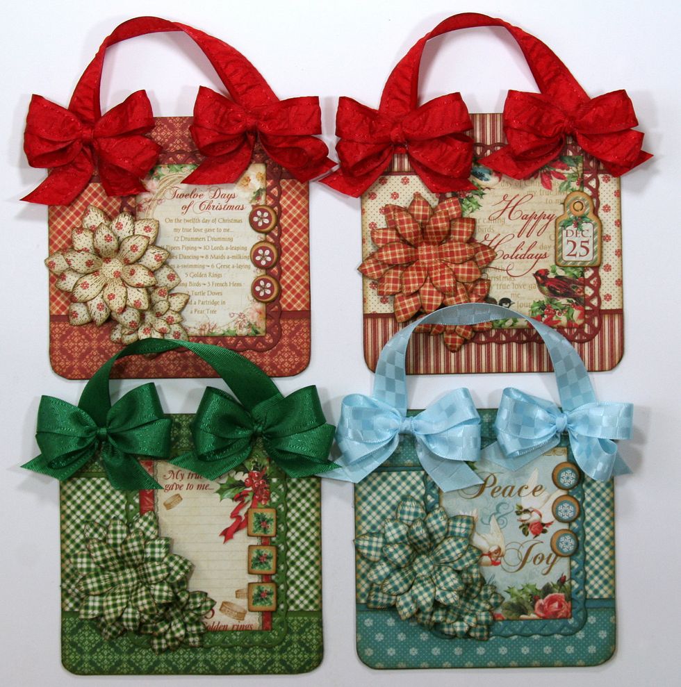 Cover the ends of the ribbon with sweet little poofy bows.