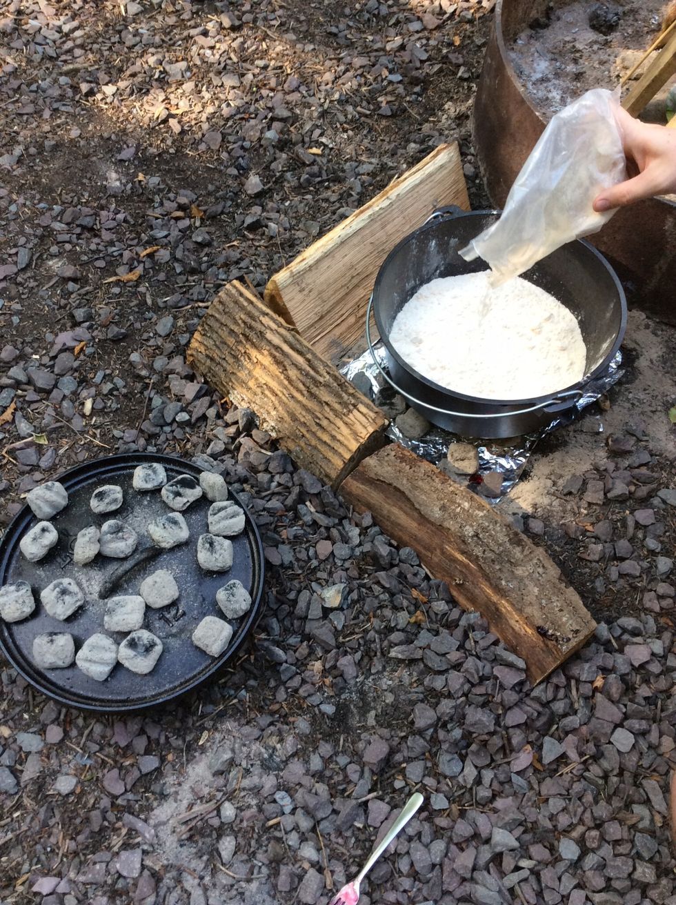 Cover the entire top of the fruit with the cake mix.