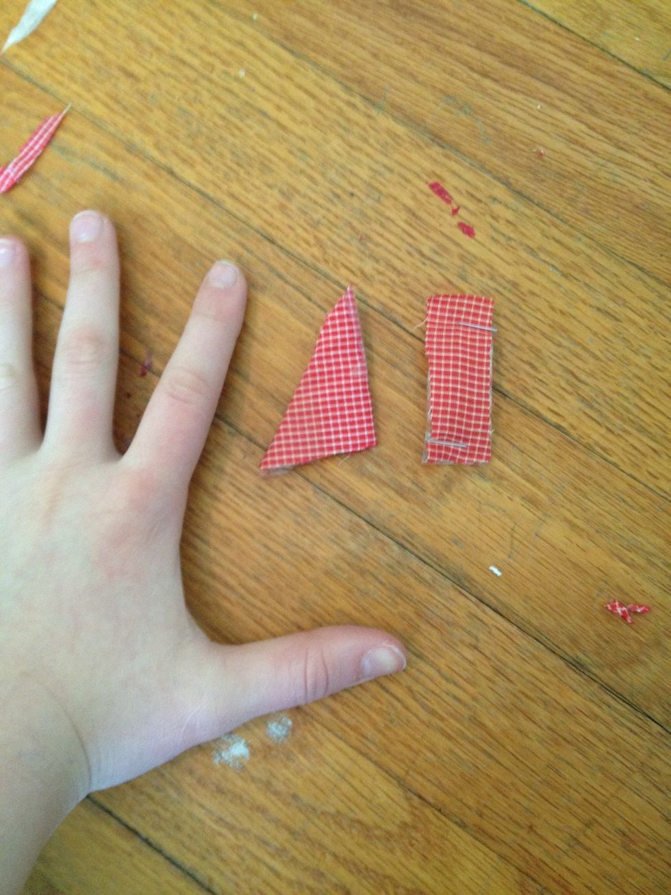 Cover the first pointed edge in red fabric, use the same technique you've been using. This is how large it and the first red tape shape should be.